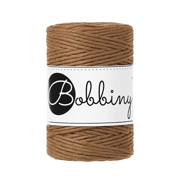 These beautiful additions to the Bobbiny range are perfect for your mini macrame projects, earrings, weavings or any other fibre art.  This super soft cord knots beautifully and makes a wonderful fringe.  Premium Macrame Cord 1.5mm  Length: 108 yards (100m)  Weight: 160gms  ﻿Single Twist  100% recycled cotton  28 Fibres 