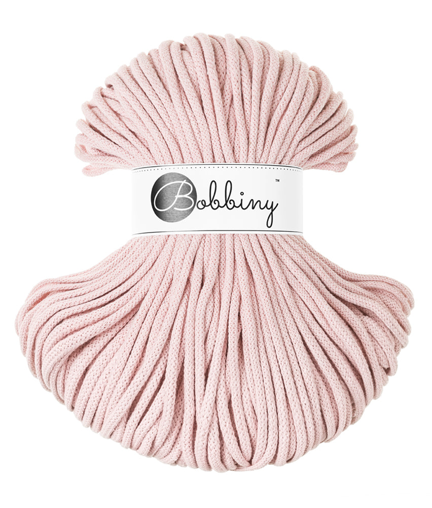 These beautiful Bobbiny cords are made in Poland from 100% recycled cottons and are non-toxic, certified safe for children and meet certified worldwide textile standards.  Shown here in the gorgeous new shade of 'Pastel Pink'  5mm Diameter  100 metres Length  Recommended for use with 10-12mm crochet or knitting needles  Cotton inner and outer layers, perfect for use with Macrame, Crochet or Knitting