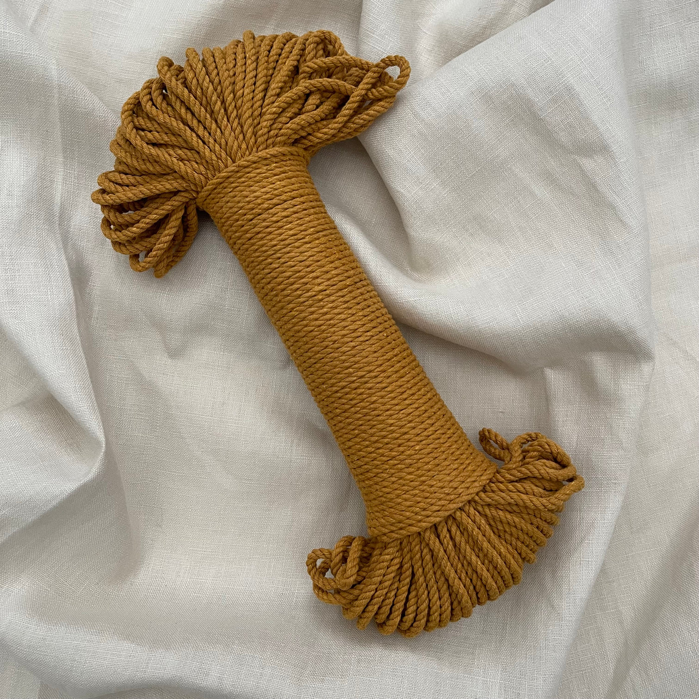Macrame 3ply cotton rope 4mm in a classical 'Mustard' colour is a fantastic addition to your fibre collection and is perfect for macrame projects such as plant hangers or pieces that require that little bit of extra guts!