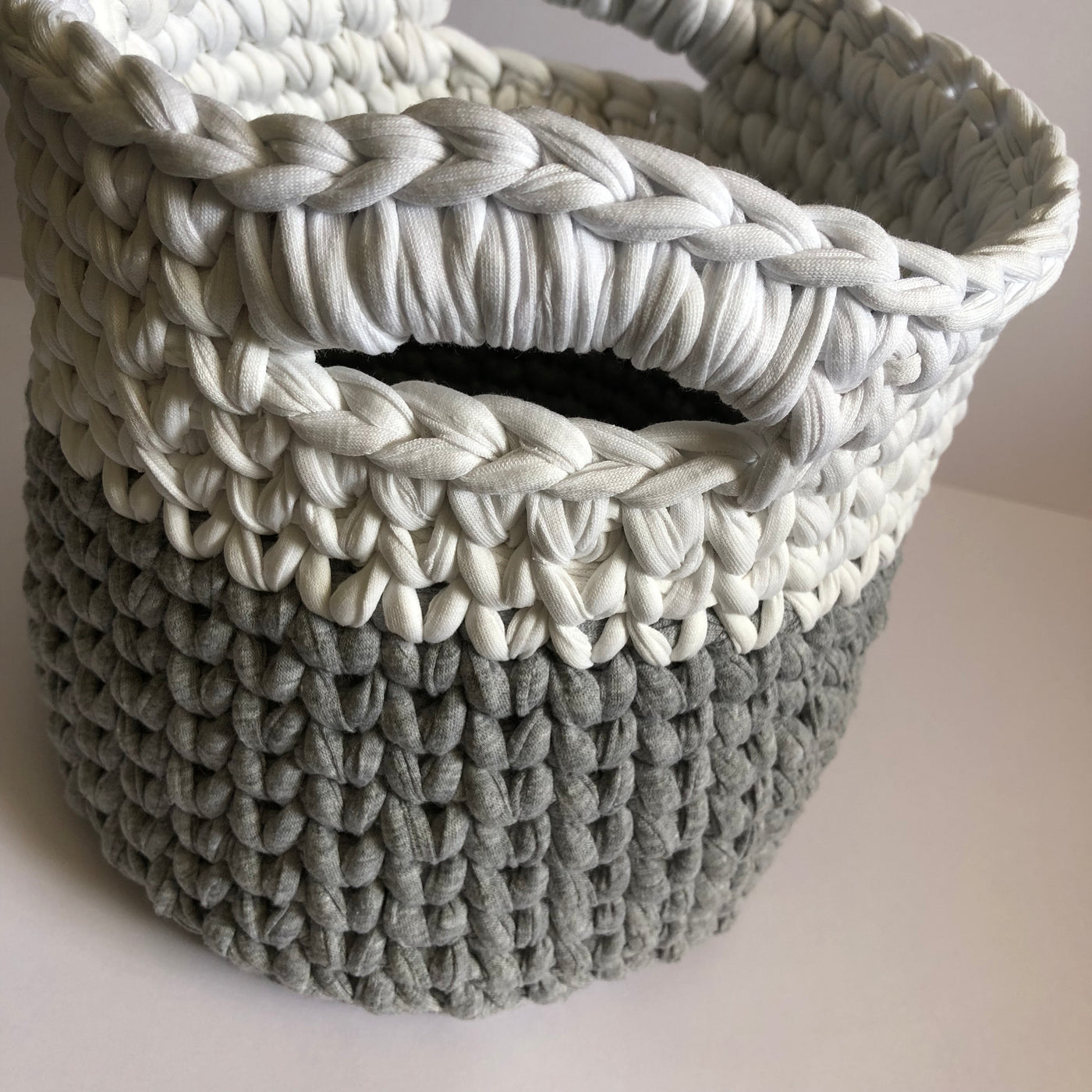 Where can I find Patterns Crochet Basket with Handles Pattern PDF? This pattern is designed using our T-shirt Yarn and recommended for advanced beginners. You will need a 12mm (US O) or similar hook. It is written in US terminology and uses crochet abbreviations. 9 pages in length, including step-by-step photographs, you will receive a PDF copy via email within 24 hours after your order is complete.