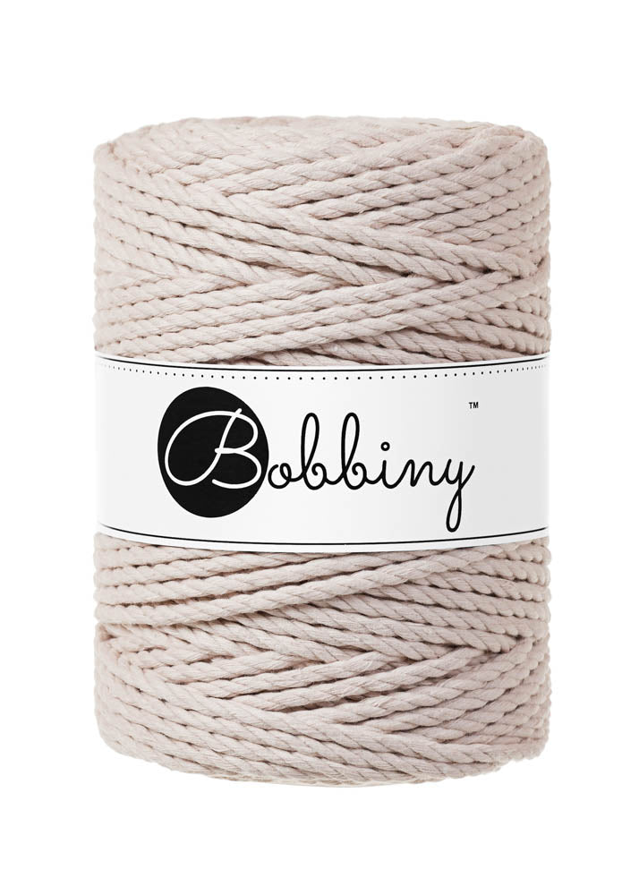 This superb product from Bobbiny is the latest addition to their gorgeous range of products.  Made from 100% recycled cotton, it is perfect for Macrame projects due to its sturdiness. It contains no harmful dyes or chemicals and is OEKO-TEX certified.  This super soft triple twist rope also makes the most spectacular fringes and tassels.  Length: 100m (108 Yards)  Weight: 800gms  Contains 120 Fibres ( 3x40 )  Also available in 3mm