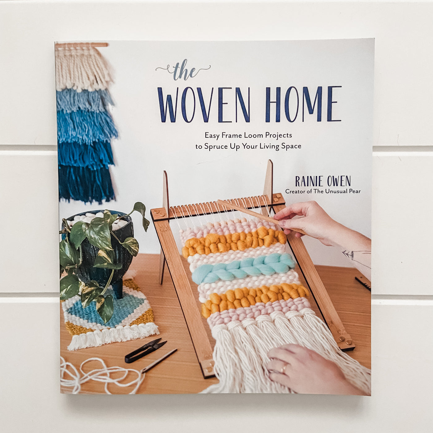 If weaving is your thing, or you have just ventured into the world of warps, wefts and looms then this beautiful book written by Australian Fibre enthusiast, Rainie Owen is just for you!  Rainie shares her tips and tricks to help you on your way if you are a beginner or to challenge you if you are a little more advanced.  With 20 projects to choose from, the possibilities are varied, and the beautiful photos will get the creative juices flowing!  Rainie explores various techniques such as the Tabby Weave an