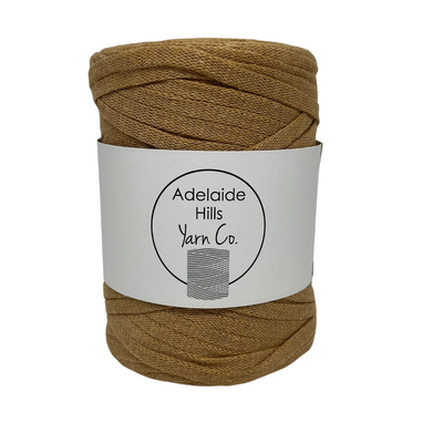 Where can I find Ribbon Yarn? is a beautifully soft woven tape-like fibre perfect for use with crochet, knitting, weaving or any fibre art. Made from 100% recycled fibres.   Shown here in the beautiful 'Caramel' shade.   Length: 130metres +/-  Weight: 250gms +/-  For use with approx 7mm or above hooks depending on your project
