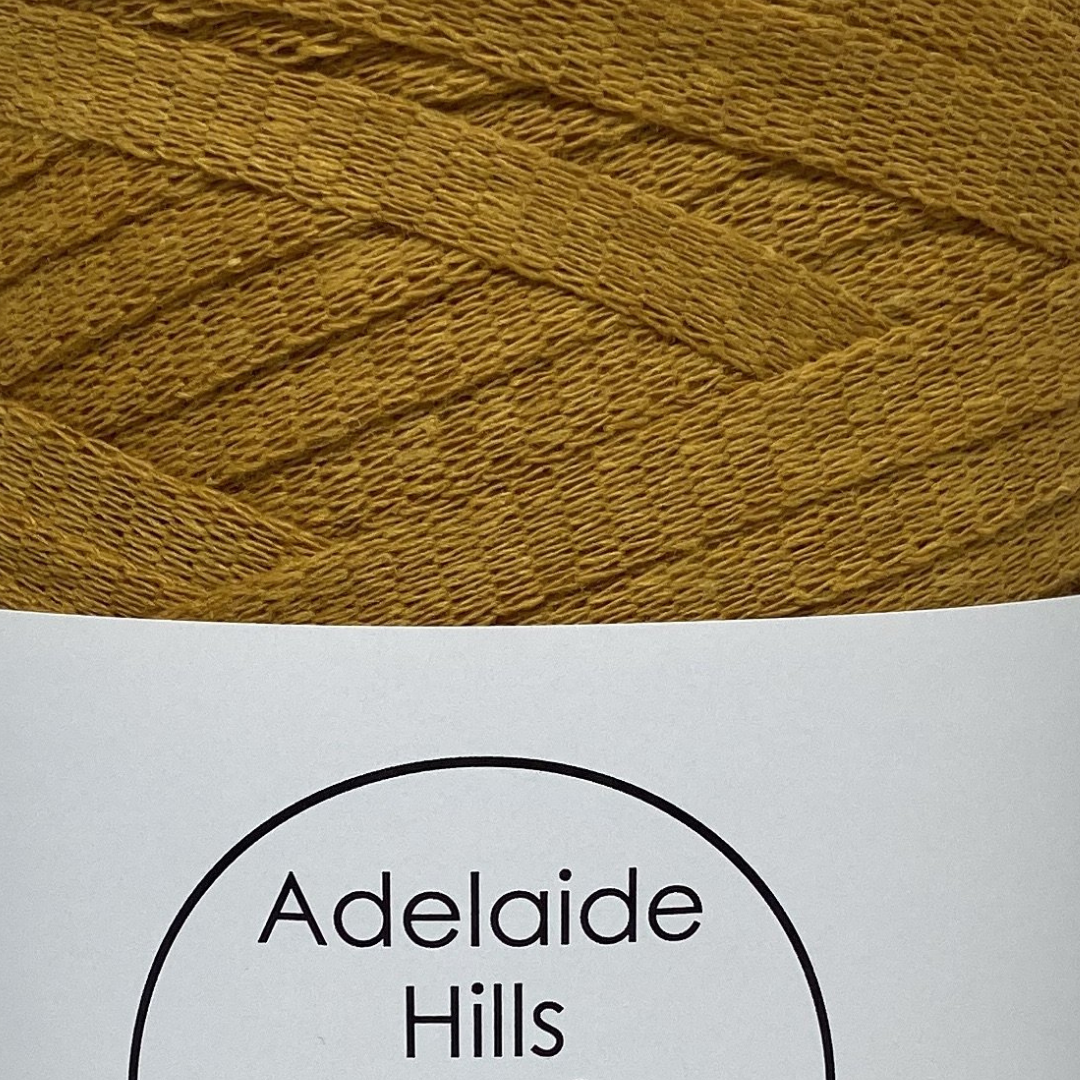 Where can I find Ribbon Yarn YELLOWS Mustard? Our Ribbon Yarn is a beautifully soft woven tape-like fibre perfect for use with crochet, knitting, weaving or any fibre art. Made from 100% recycled fibres.   Length: 130metres +/-  Weight: 250gms +/-  For use with approx 7mm or above hooks depending on your project